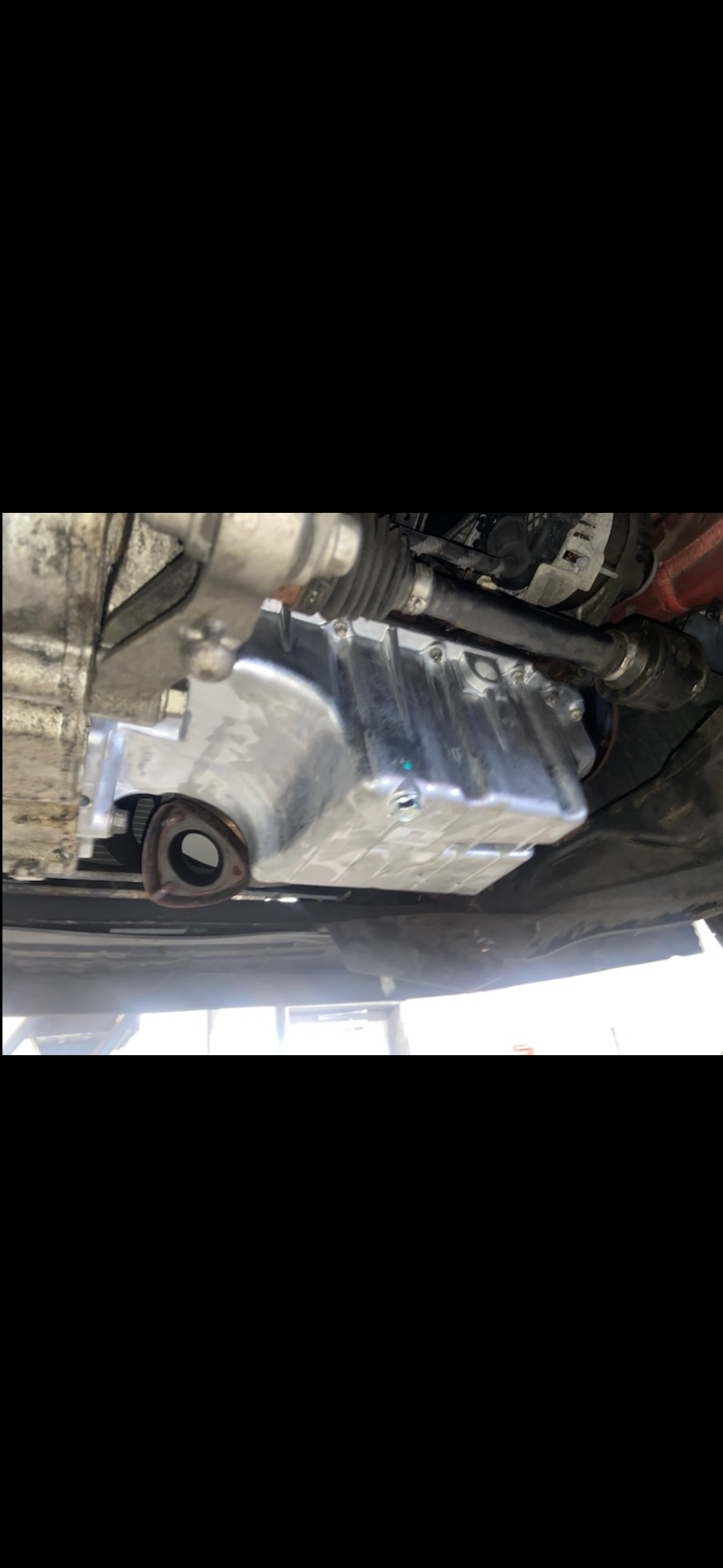 Mike working on a vehicle at a customer location